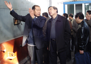 宝鸡市委常委组织部长乔军带领市级各部门领导在海浪锅炉公司实际视察公司锅炉示范工程